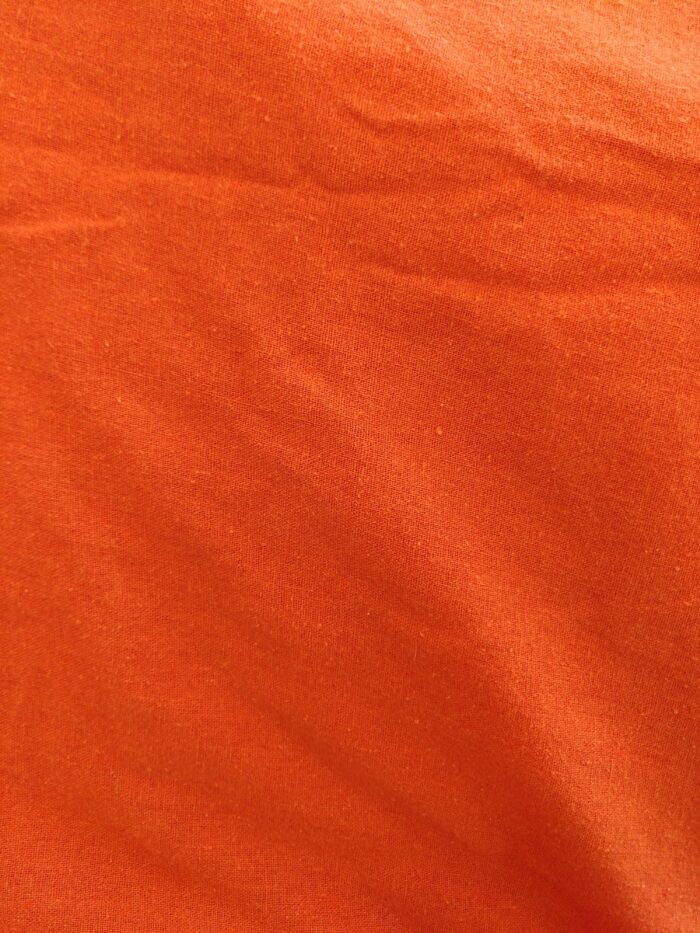 Tissu orange uni pour l'enveloppe du Marmitou