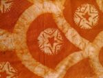 Tissu en pagne africain couleur rouille pour l'extérieur du Marmitou