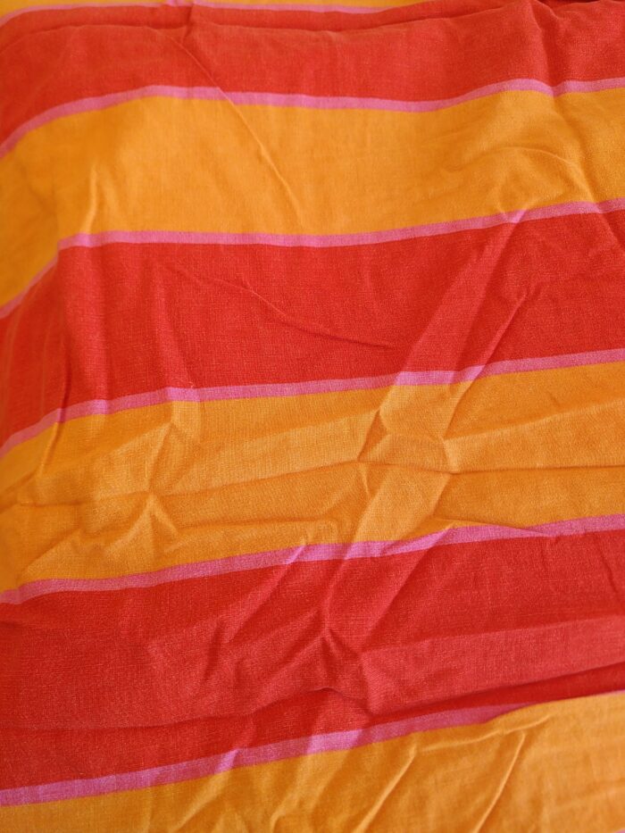 Tissu extérieur de la marmite norvégienne réalisée avec un drap de lit à larges bandes de couleur