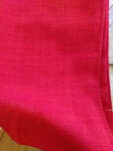 Tissu extérieur de la marmite norvégienne réalisée avec une nappe rouge recyclée
